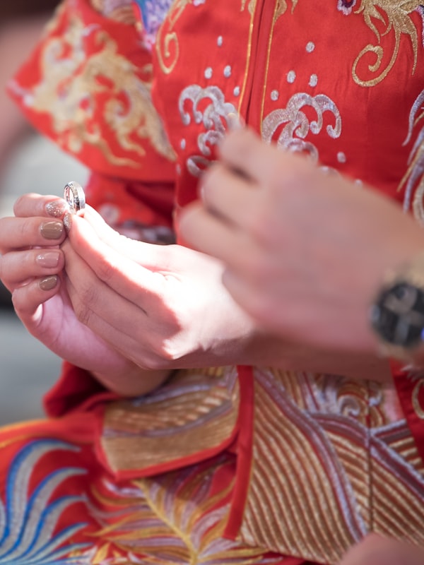 Couple performing the traditional Chinese tea ceremony for their elders